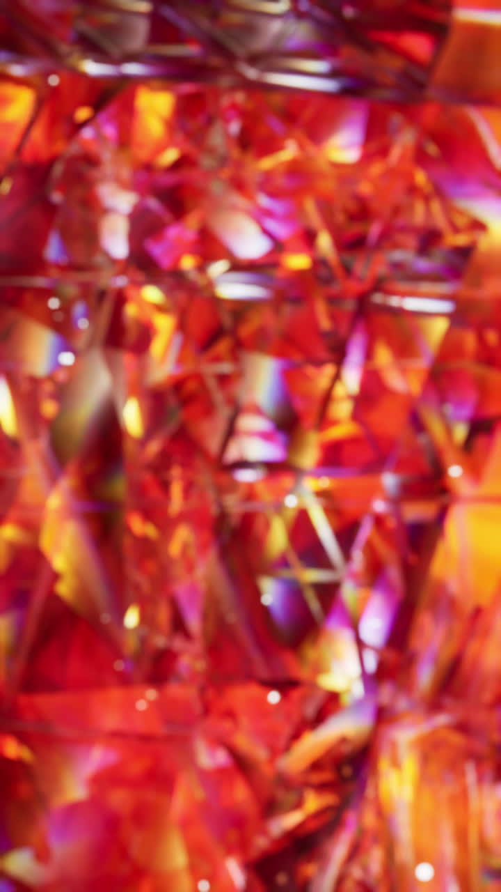 생생한 색의 삼각형으로 된 추상적인 기하학적 패턴