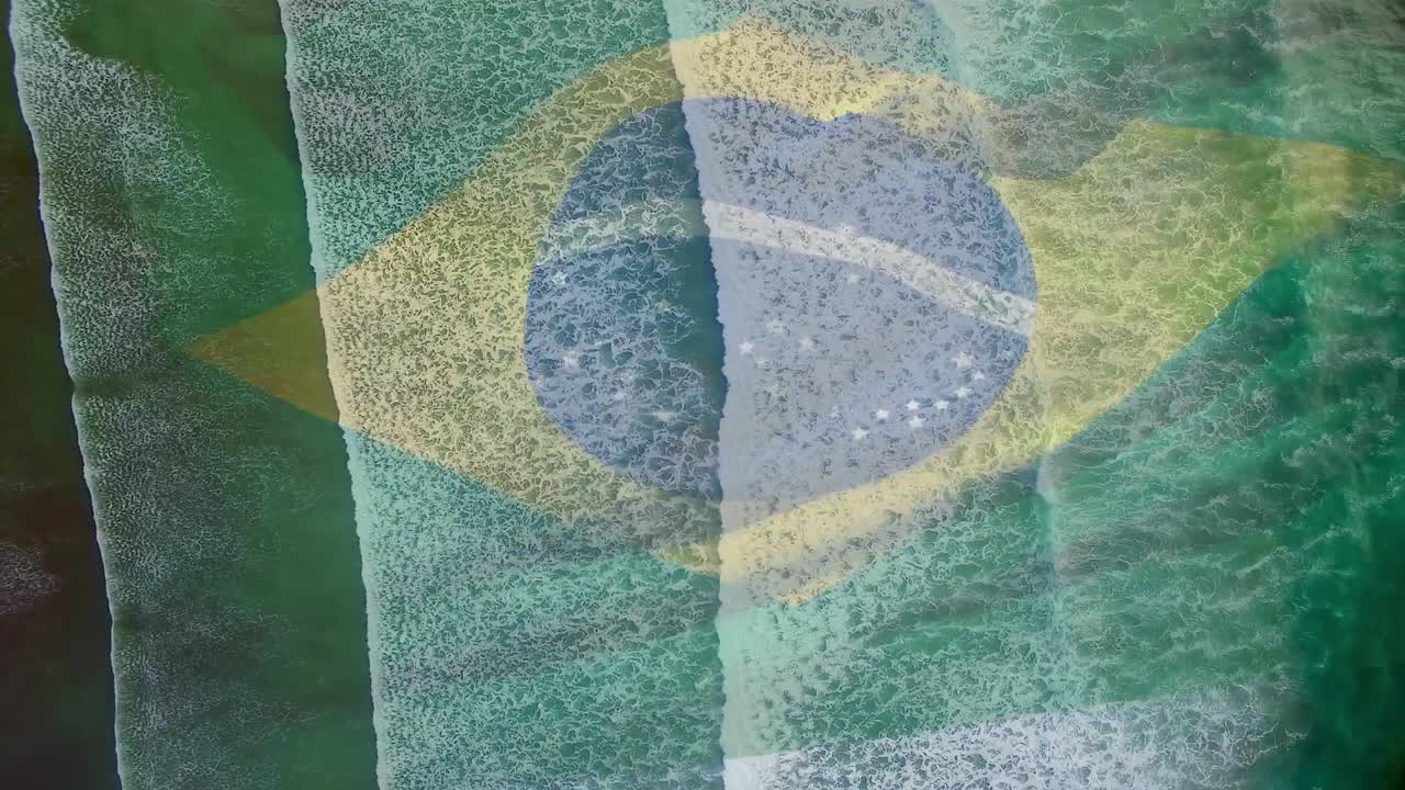 animación de la bandera de brasil ondeando sobre vista aérea de las olas en el mar