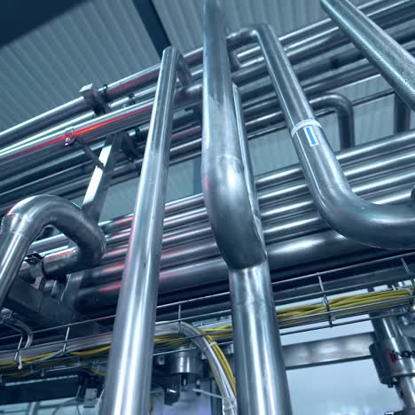 milk factory production. factory industrial tubes used in a manufacturing process