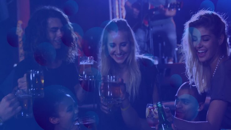 Group of friends raising beer mugs in pub, highlighting entertainment-driven neon graphs and icons