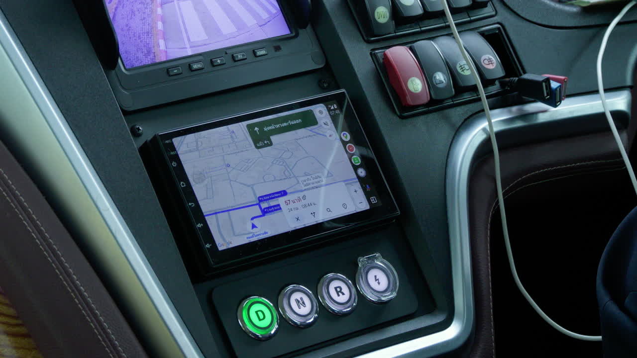 Finding driving directions with the google maps application on the screen. Car interior view with touchscreen monitor display. car dashboard with various navigation and informative apps.