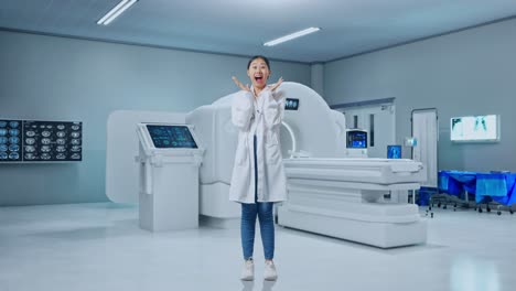 full body of asian woman doctor with stethoscope showing gesture hands palm, saying wow, and smiling with mri machine in the hospital