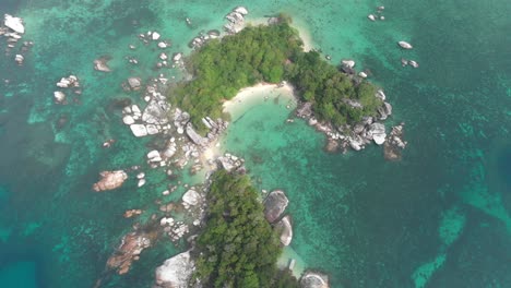 Top-view-of-tropical-island-at-belitung-Indonesia-during-day-time,-aerial