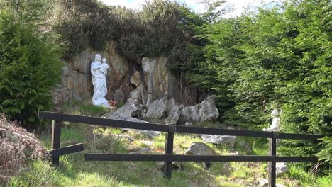 grotto at the entrance to an old famine graveyard in ireland in spring