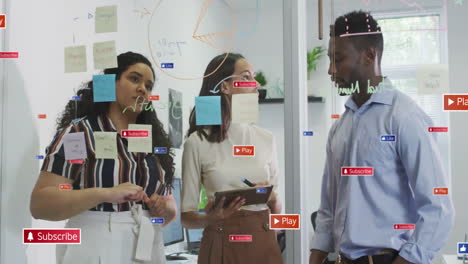 marketing team sketching charts on whiteboard, with floating subscribe and play icons