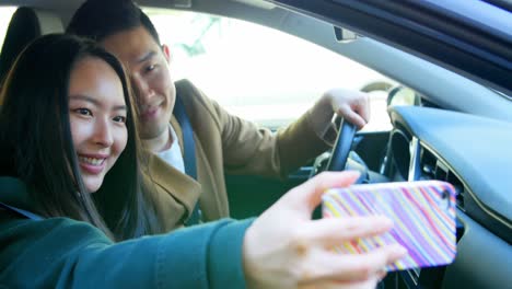 happy couple taking selfie with mobile phone 4k