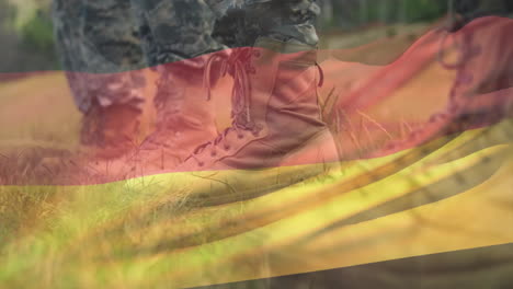 military boots on grass, german flag animation overlaying in background