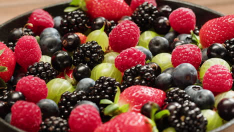 assortment of fresh berries in a pan