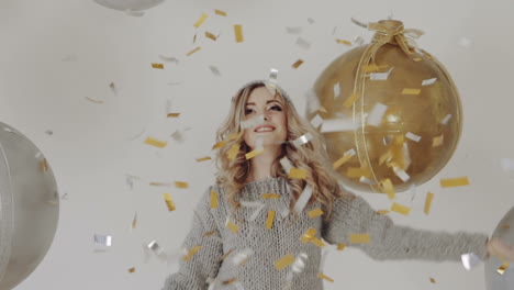 celebrating new year. celebration party with confetti falling everywhere on woman