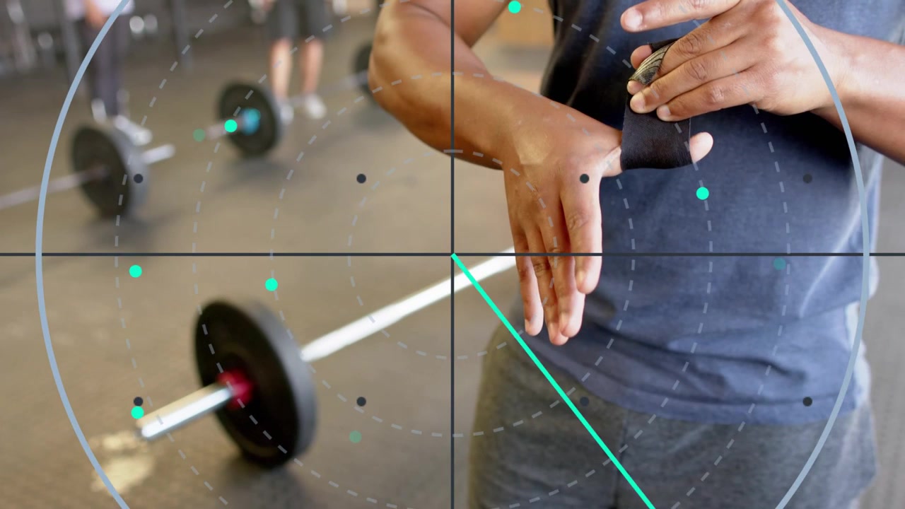 Gym participant threading wrist wrap while HUD overlay tracking hands, preparing barbell lift