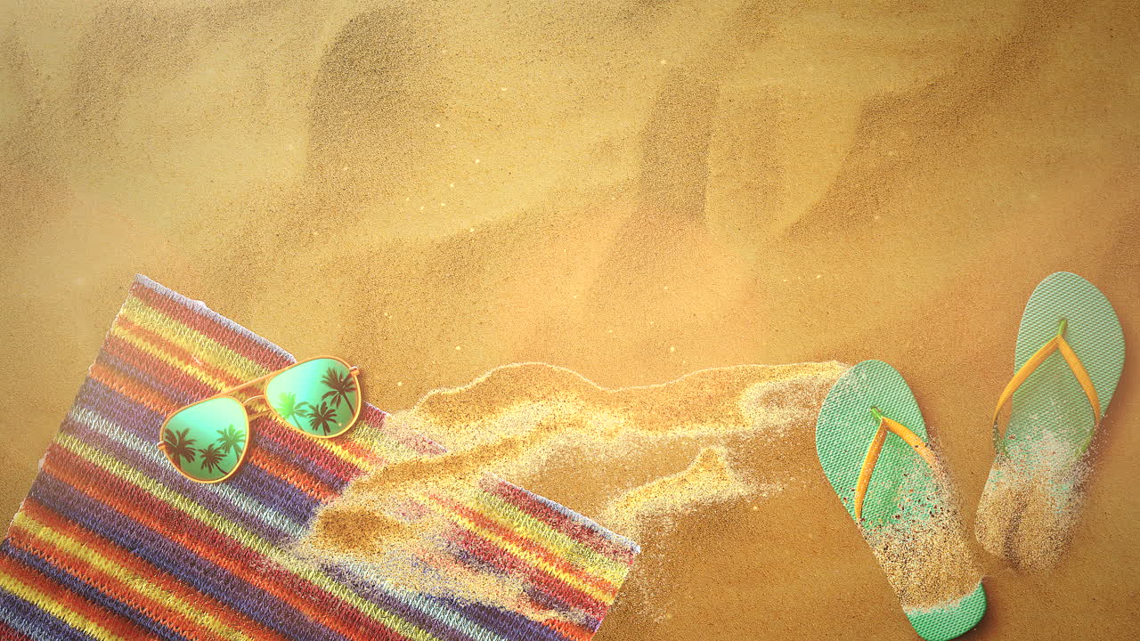 Closeup sandy beach with sandal and sunglasses
