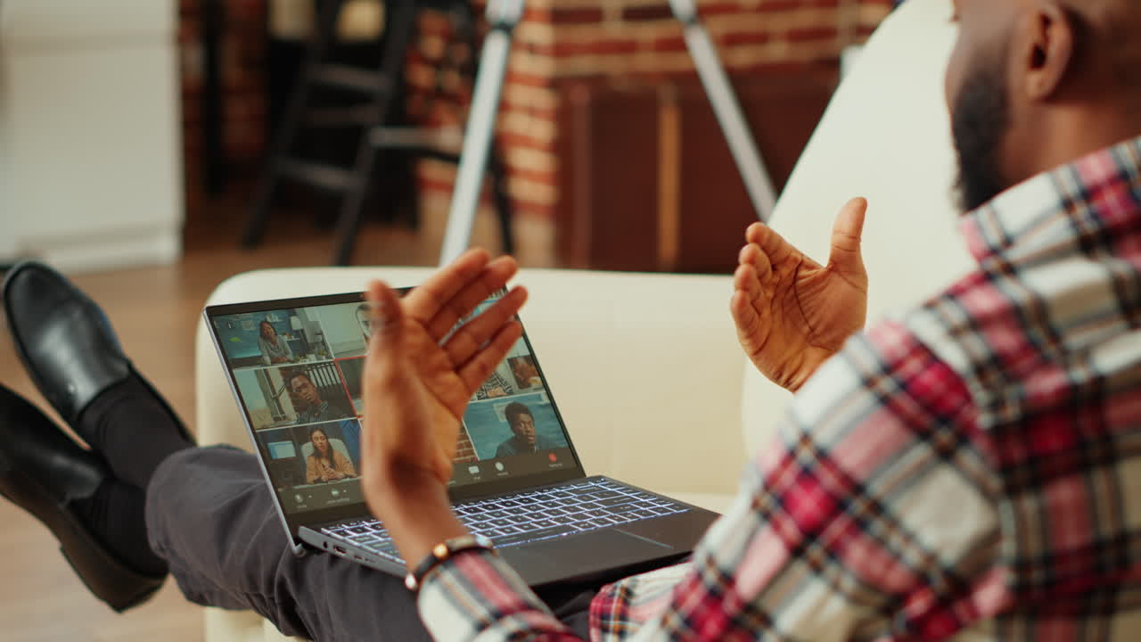 Man on Video Call with Group
