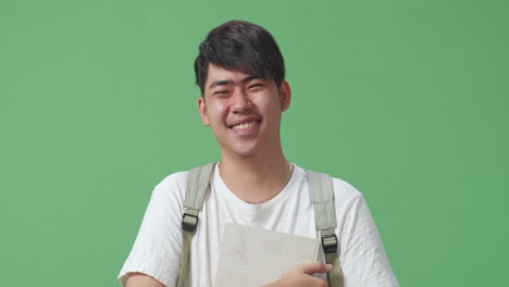 smiling student with book