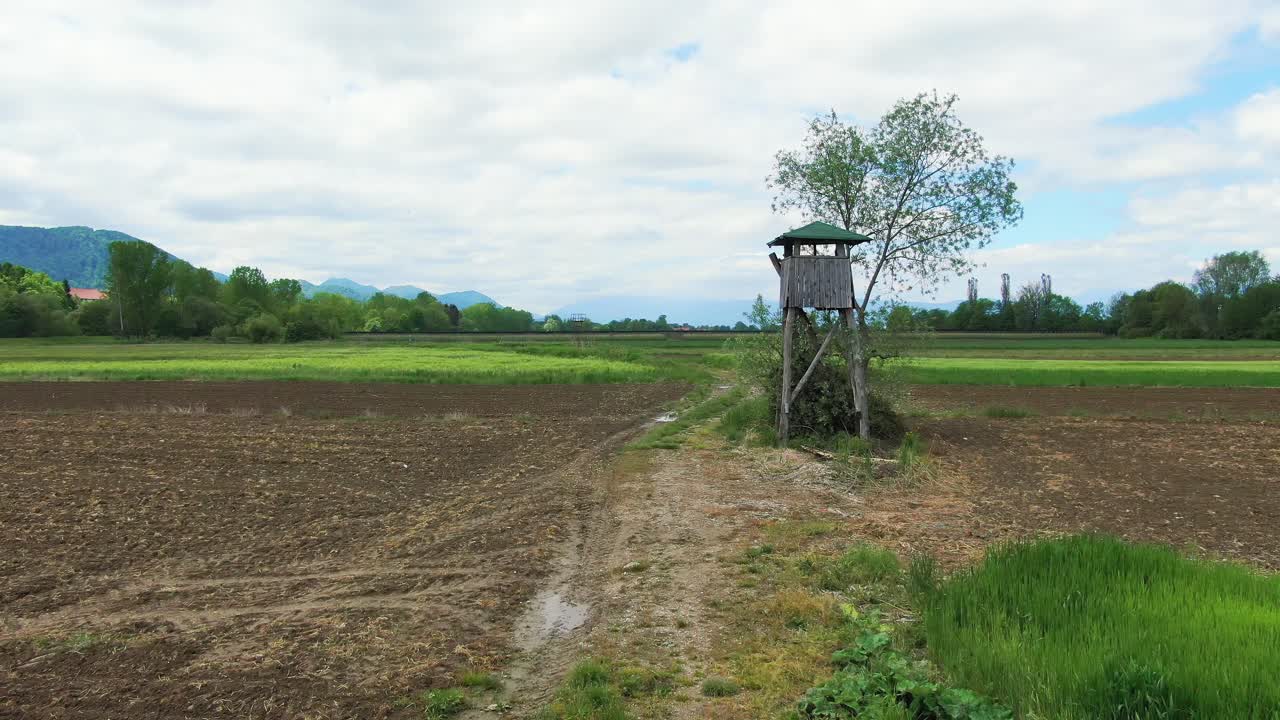 High speed drone flyover empty rural fields in Celje , Slovenia, dolly