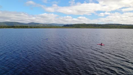 Aerial-Drone-Landscape-Kayak-Canoes-Water-Sports-at-Chiloé-Huillinco-Clean-Lake-at-Chilean-Patagonia,-Travel-Destination