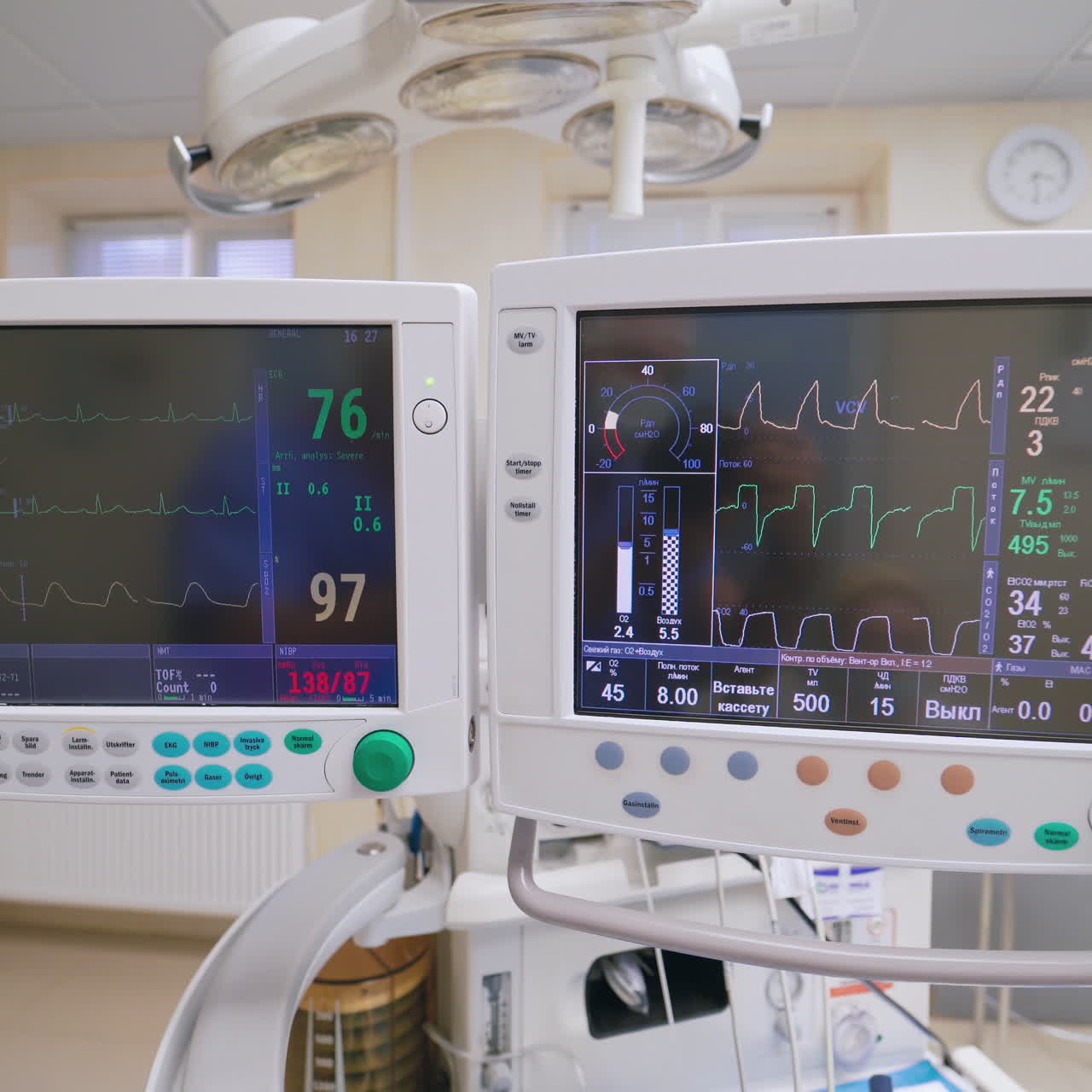 Special monitors showing heart rate and pulse. Electrocardiogram on a display. Graphics of electrical activity of patient's heart beat on two modern monitors.