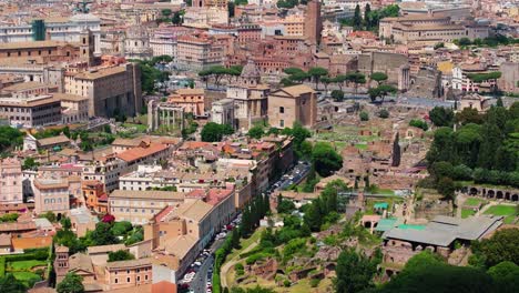 aerial pullback away from ancient roman ruins in eternal city