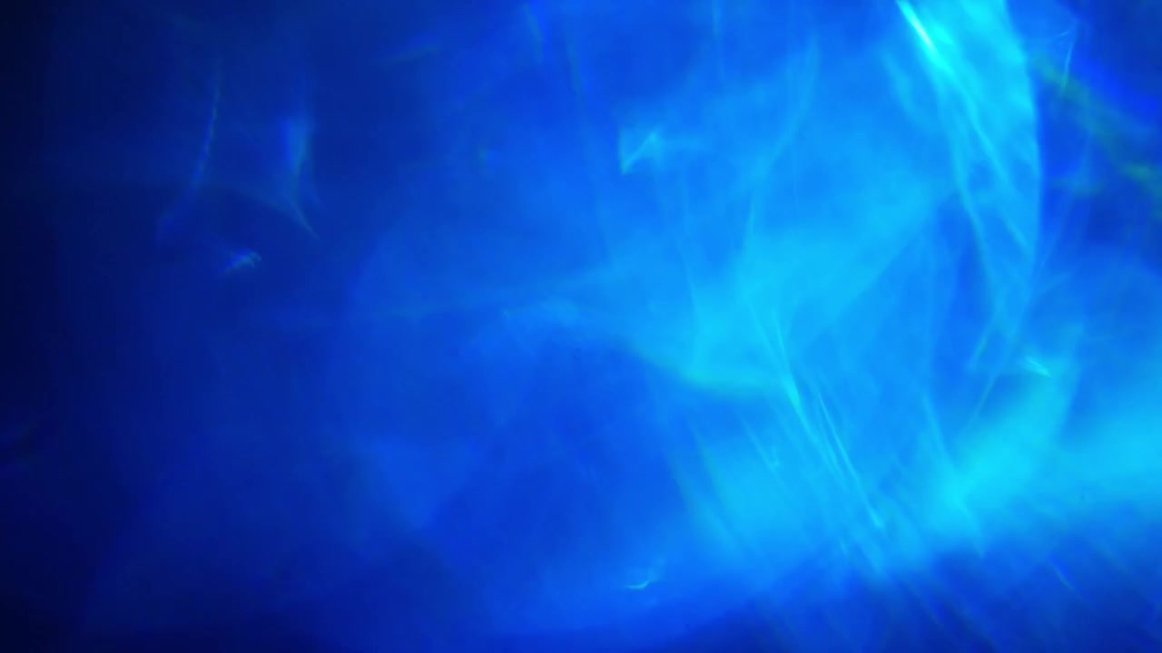 Dynamische blaue Lichtlecks und Flares auf dunklem Hintergrund