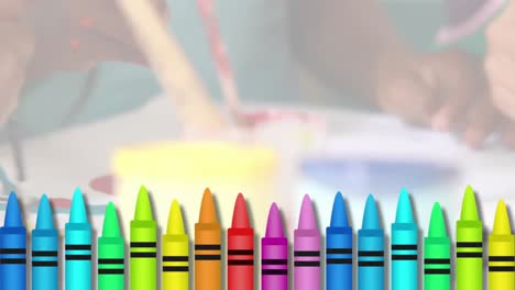 animation of colored crayons icons against mid section of kids coloring in the class at school