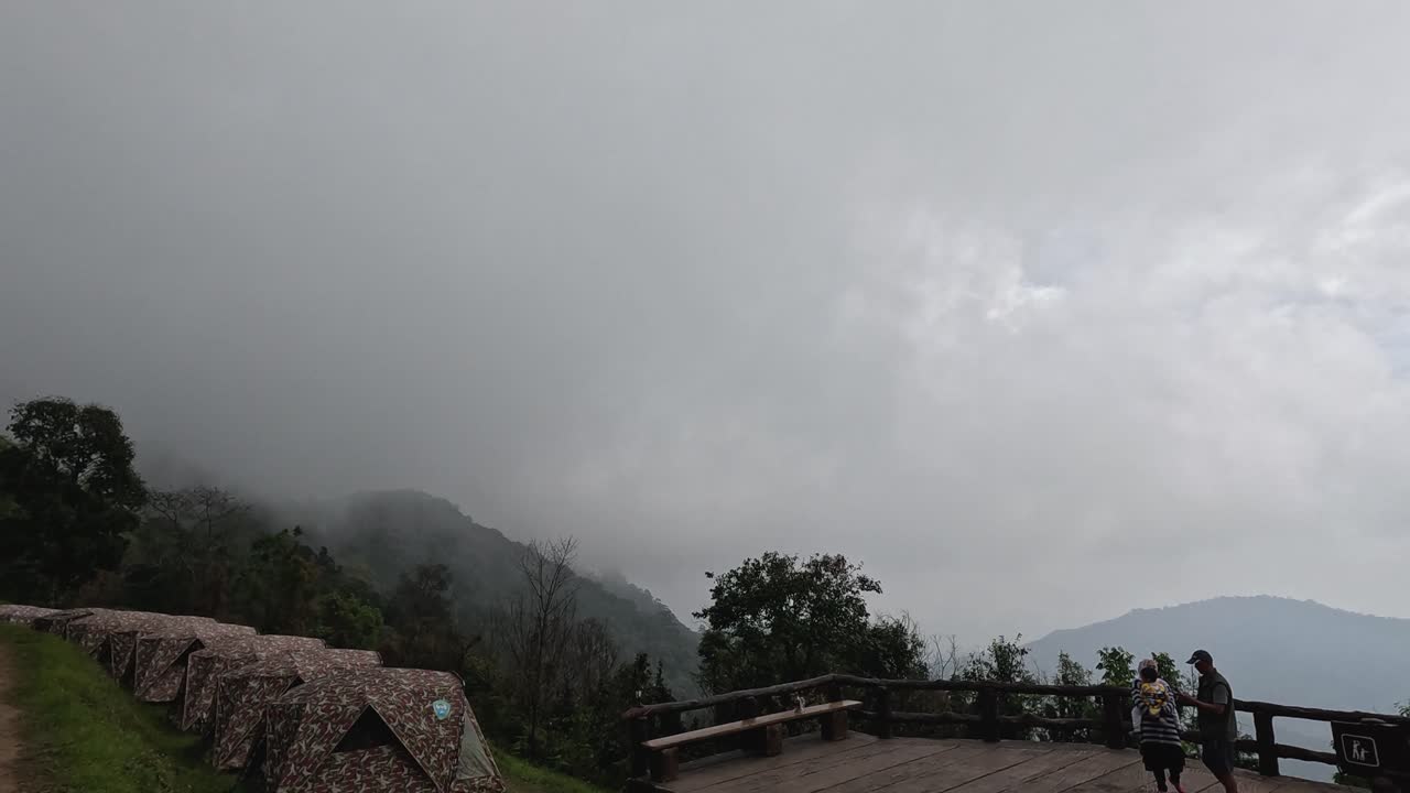 Changing weather at a scenic mountain viewpoint