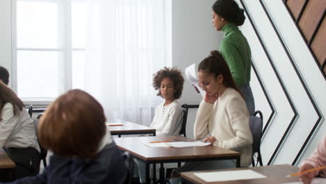 teacher and students at school