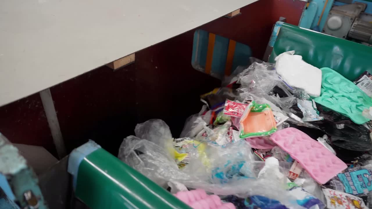 Conveyor Belt Sorting Mixed Waste Materials.