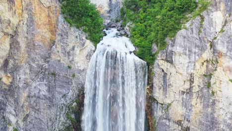 boka waterfall supplied by karst spring with vertical limestone wall