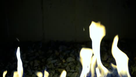 Different-angles-of-artificial-fire-burning-giving-a-modern,-rusty,-ambiental-vibe