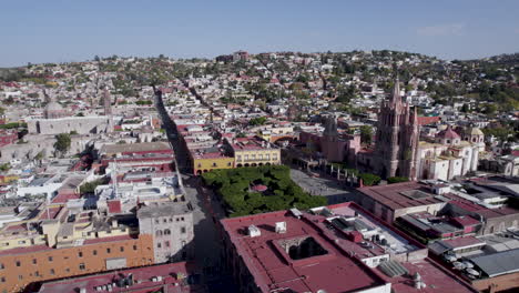 aerial drone shot of the city and the cathedral of san miguel de allende, mexico