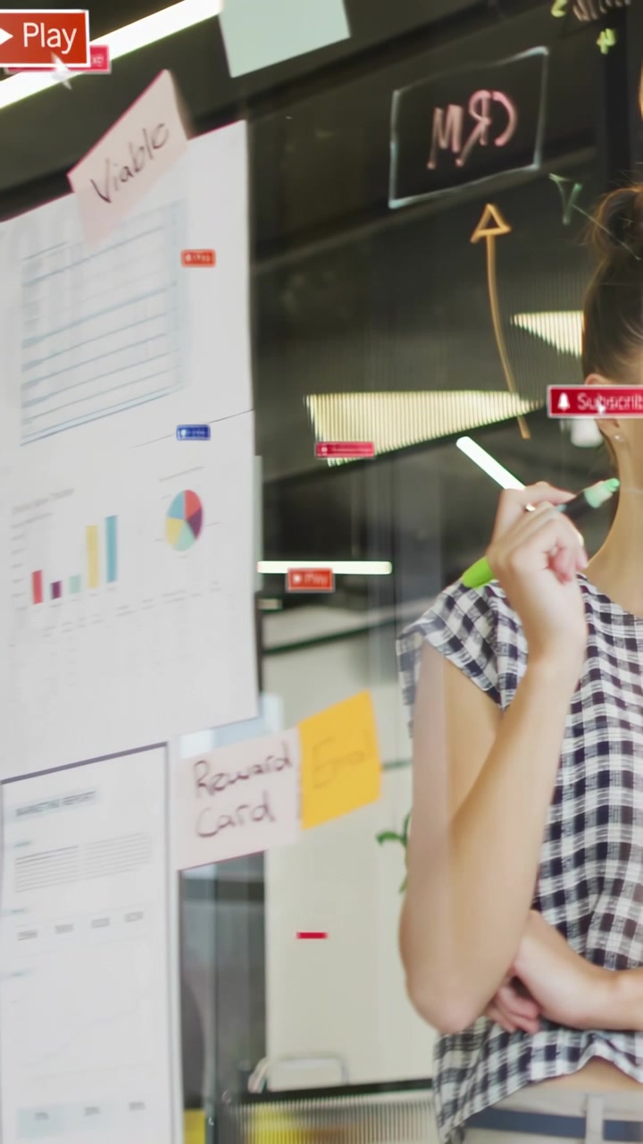 Vertical video: On play, woman pointing at glass charts for business, badges appearing over charts