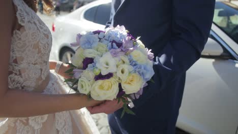 wedding couple holding bouquet