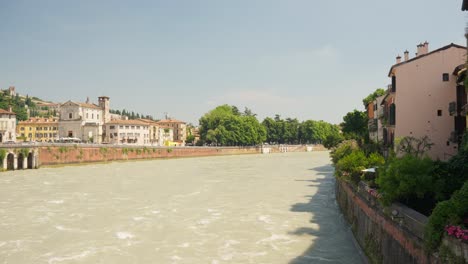 adige river in italy - panning shot