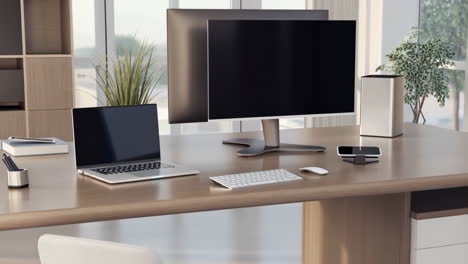 modern office desk setup with laptop and monitor