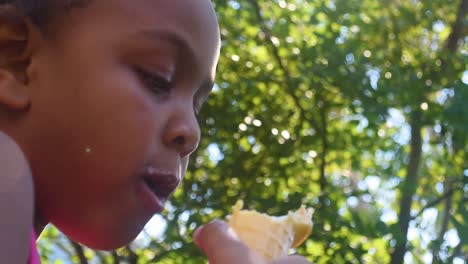 little girl eating ice cream cone