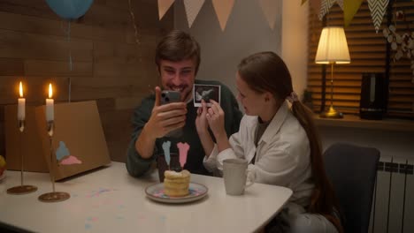 happy couple celebrating a pregnancy announcement