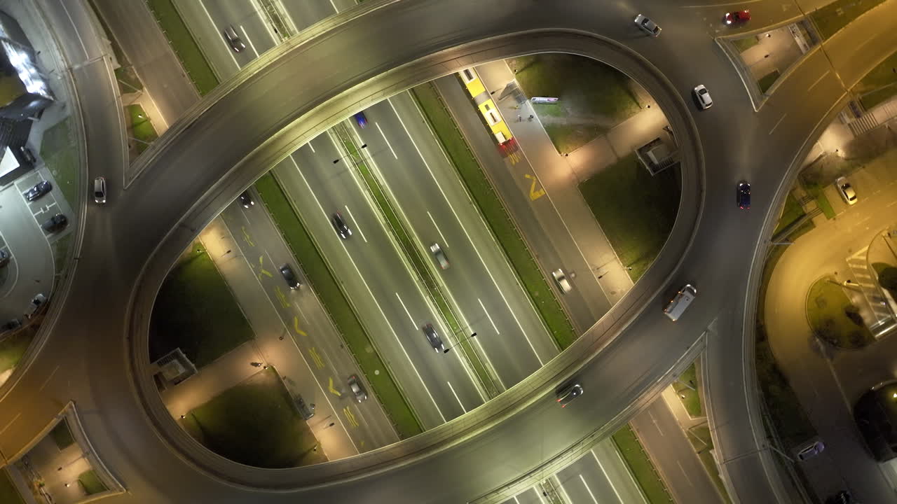 Aerial View of Busy Highway Interchange at Night