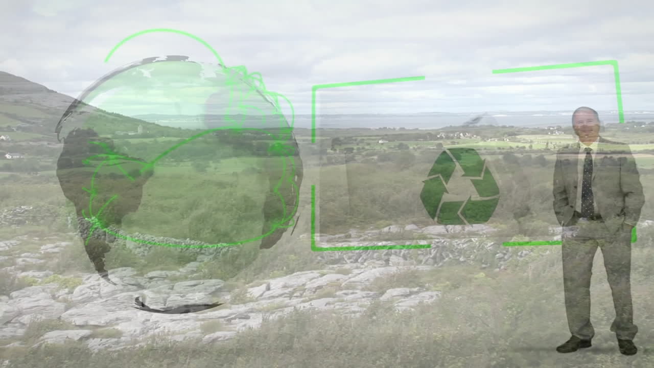 Man using tablet with recycling and globe animation over scenic landscape