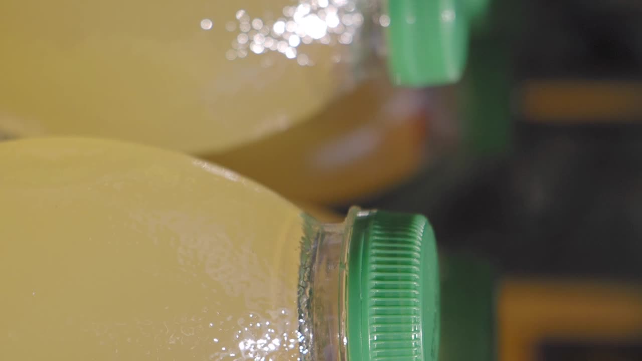 Juice bottles with green caps