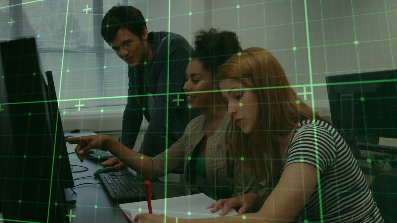Three people collaborating at computers with digital grid overlay animation