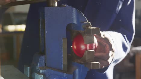 Close-up-view-of-man-working-in-factory