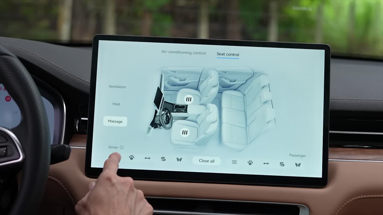 finger using multimedia touchscreen ID3 system for modern automobiles. Green energy, zero-emission car interior view. Long-range electric vehicle, electric car brand Seres, clean energy