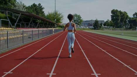 woman running on a track