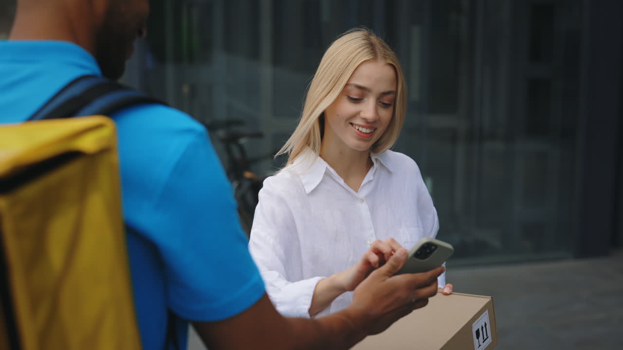 Delivery Person Delivering Package to Customer