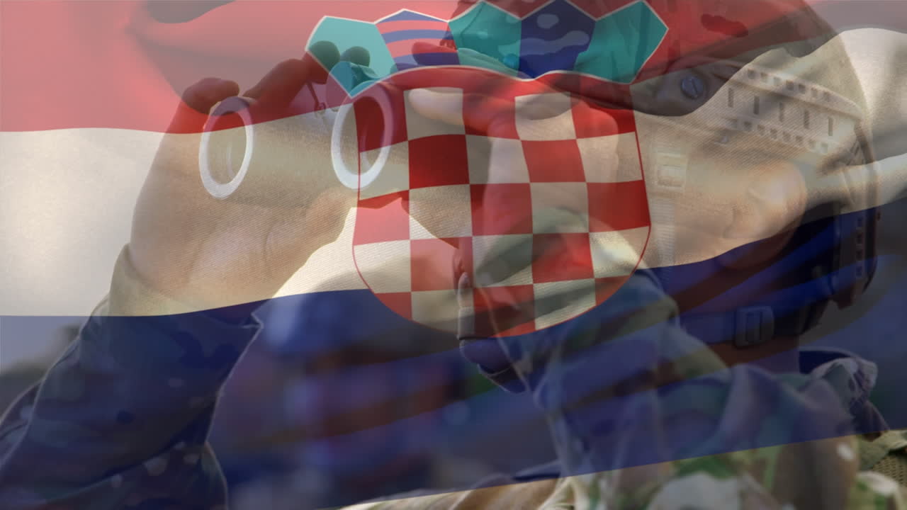 크로아티아  ⁇ 발의 애니메이션이  ⁇ 안경을 쓴 남성 군인 위에 있습니다.