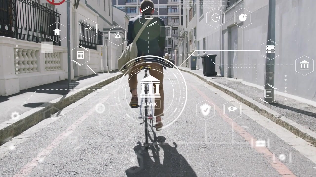 Male cyclist pedaling uphill lane, passing dollar-sign, HUD growing over rider bank icons