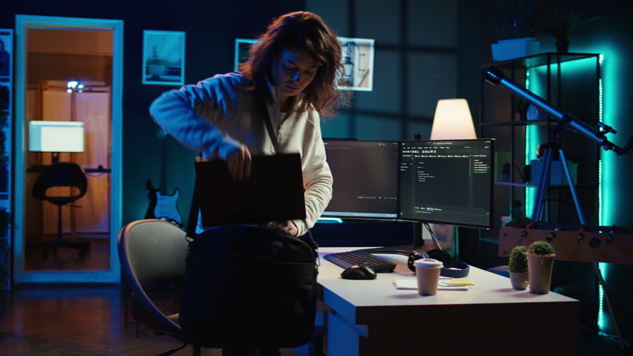 Developer holding disposable cup of coffee entering home office