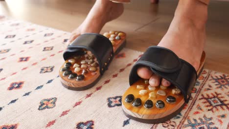 foot massage with stone massage slippers