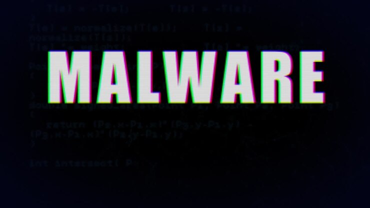 Animation of white text, malware, with flash of green data, on black background