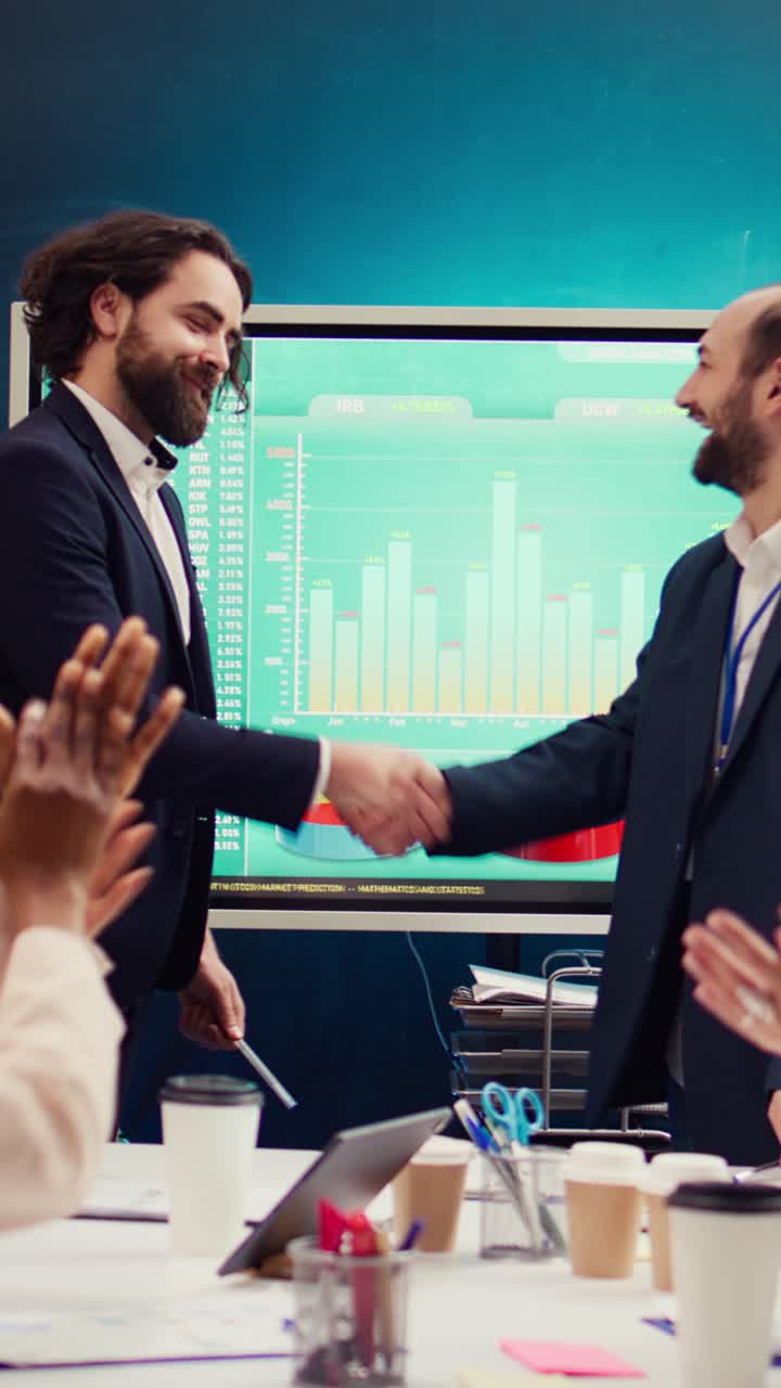 Businessmen Shake Hands After Signing Agreement in Modern Office ...