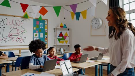 teacher interacting with students in a classroom